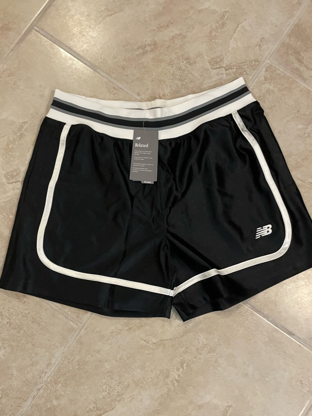 New Balance Black Shorts with White Trim and Striped Waistband
